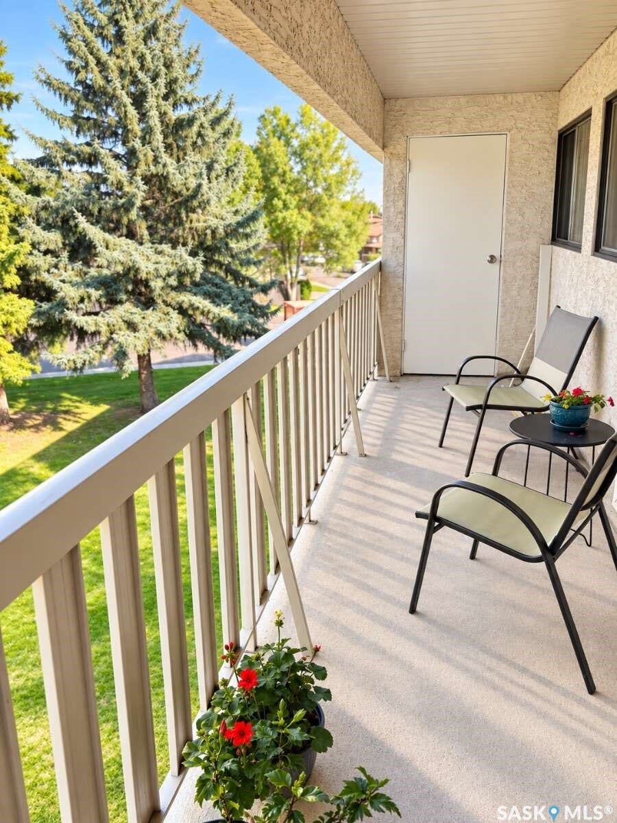 Private balcony with textured wall finish and a durable railing system
