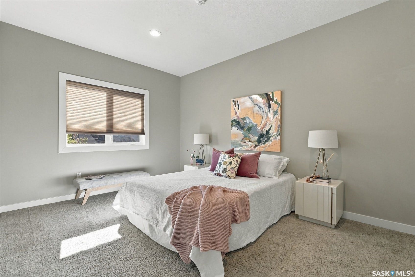 Recessed lighting, light gray wall paint, white trim, window with blinds, and light gray carpet