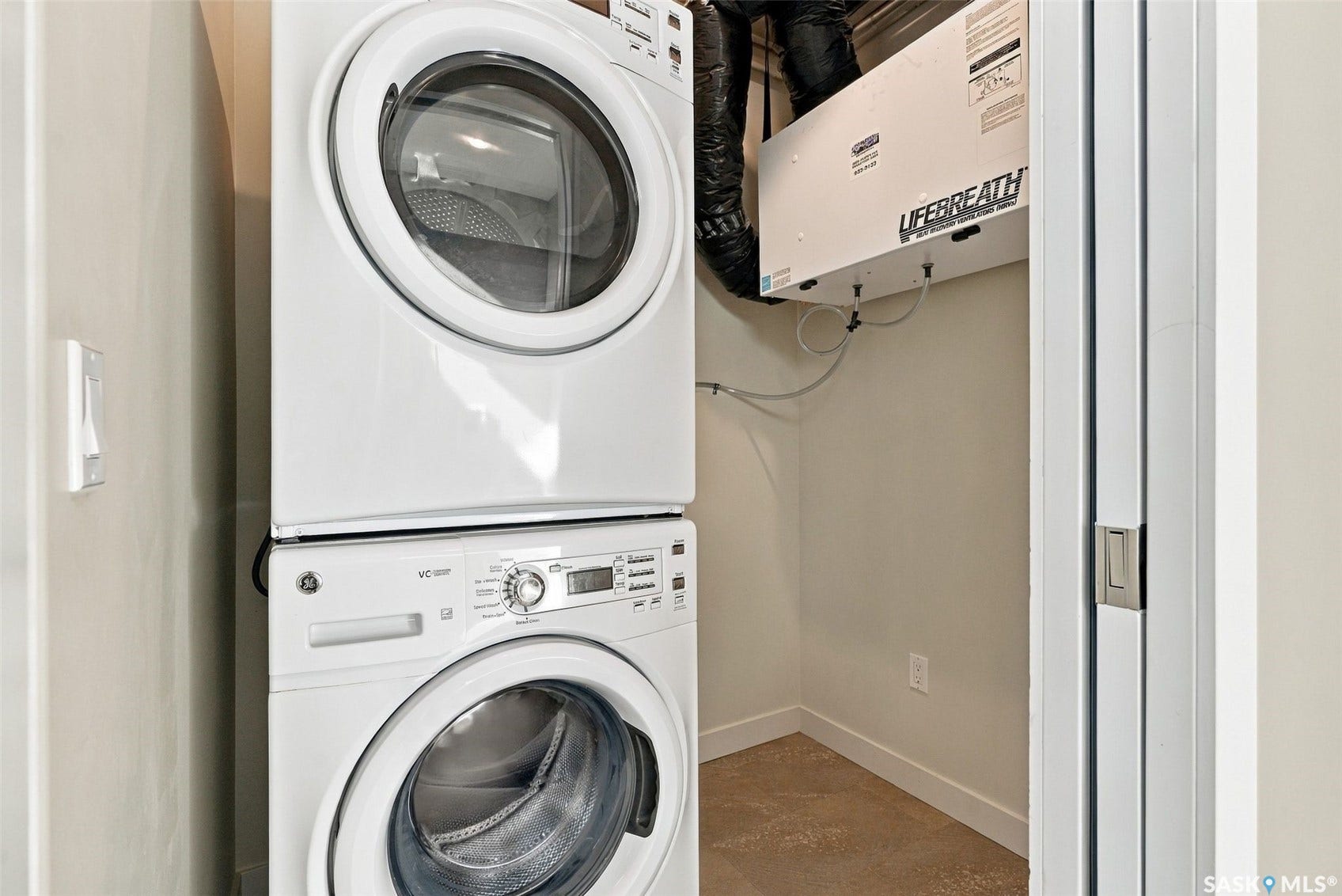 Stacked washer and dryer units