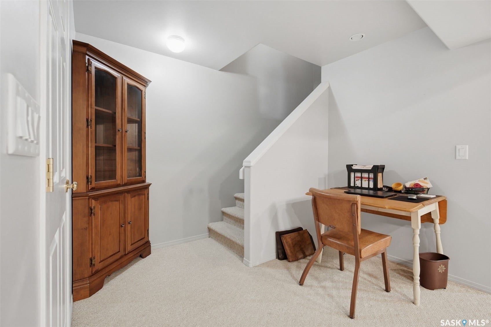 Carpeted flooring with painted walls