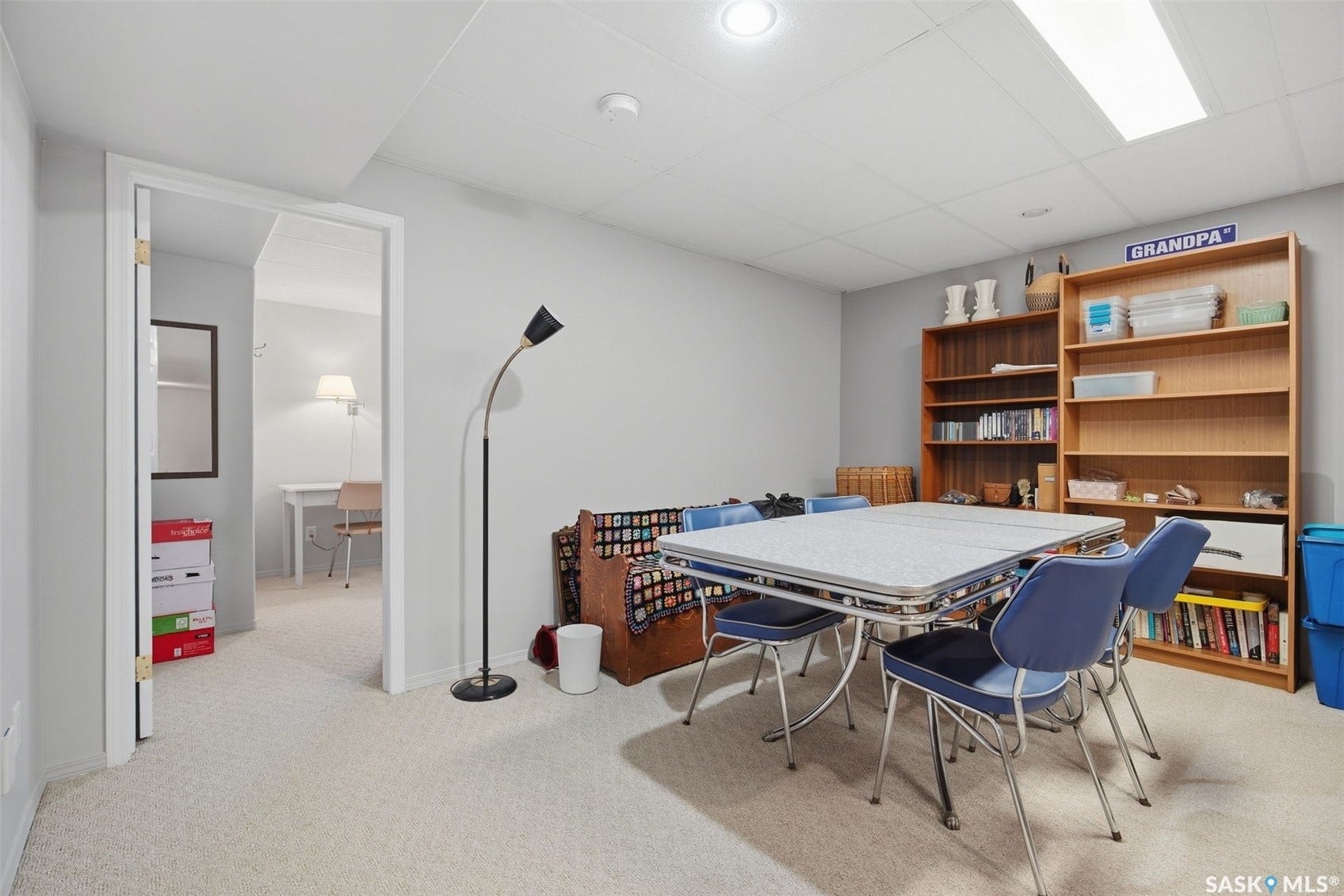 Recessed ceiling lighting, drop ceiling, and carpet flooring