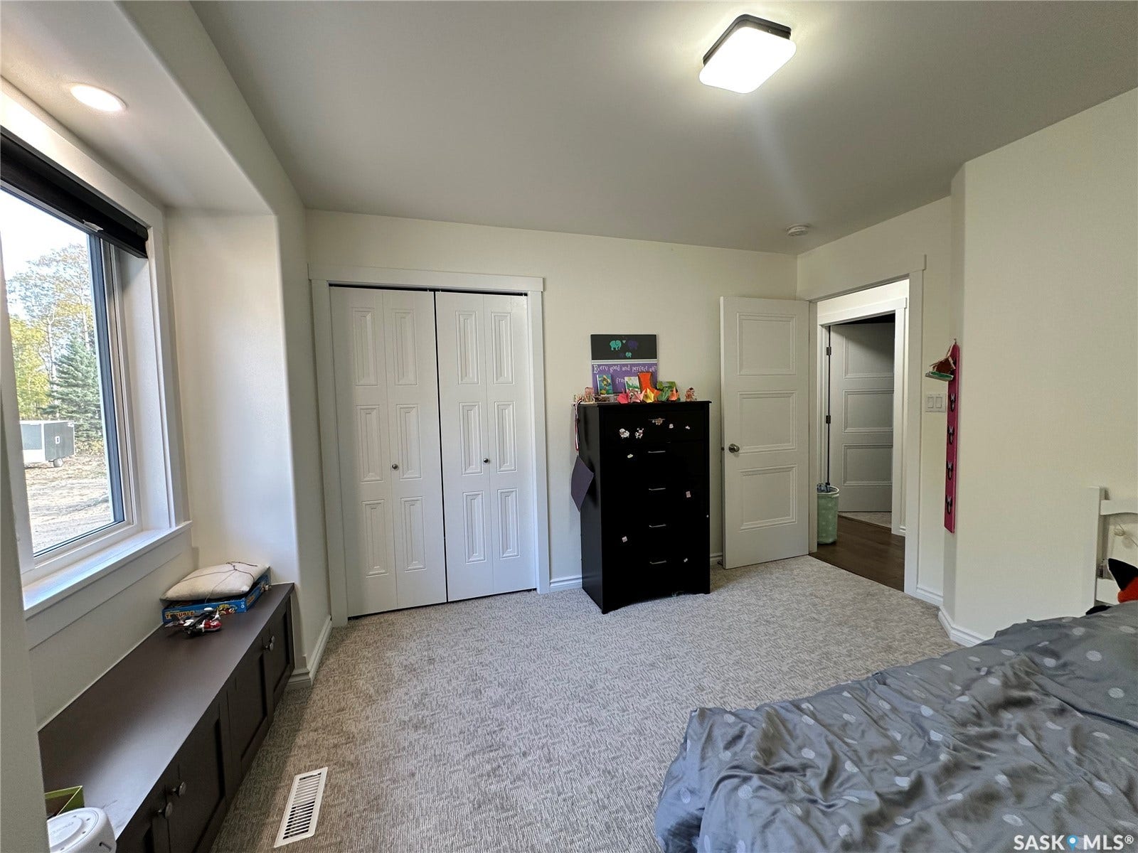 Recessed lighting and a flush mount fixture illuminate the interior