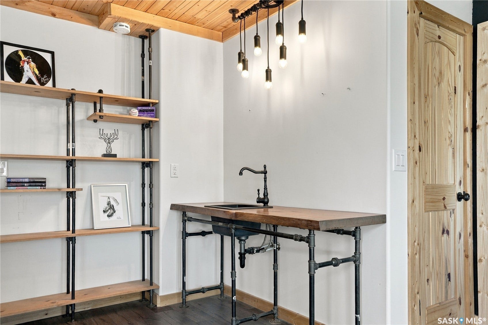 Wet bar with industrial style shelving