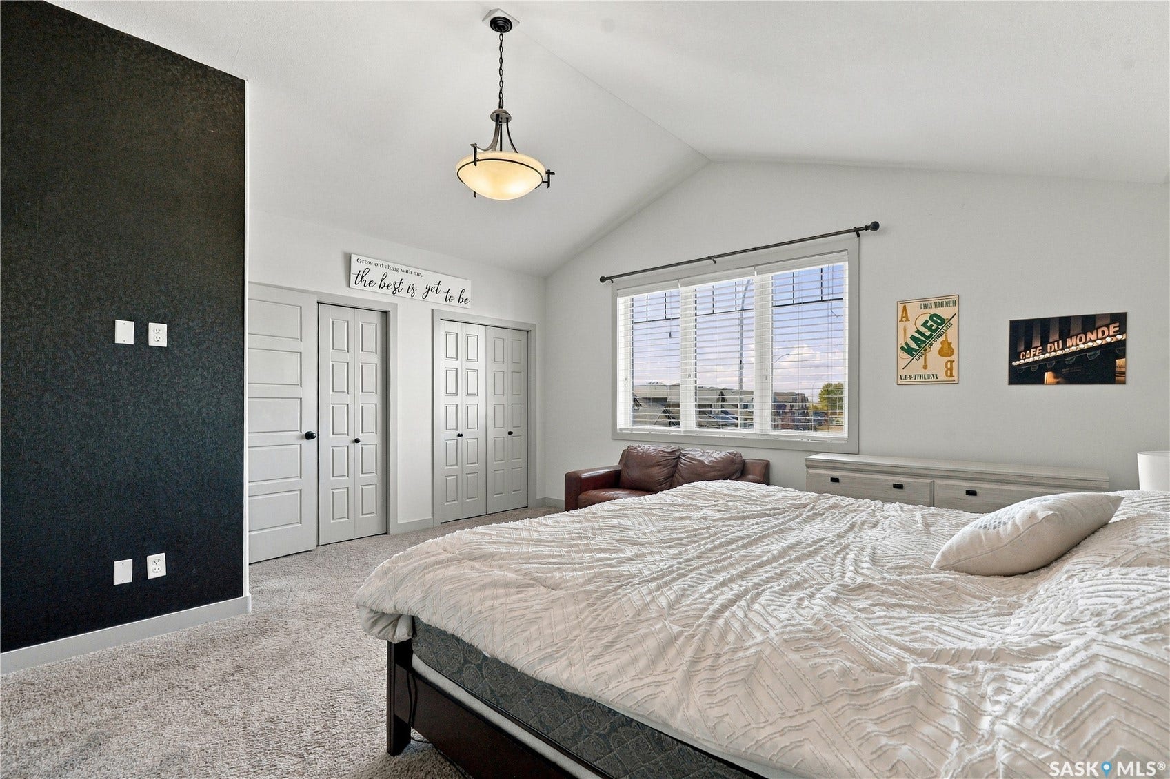 Vaulted ceilings with an accent wall, double closet and plenty of natural light