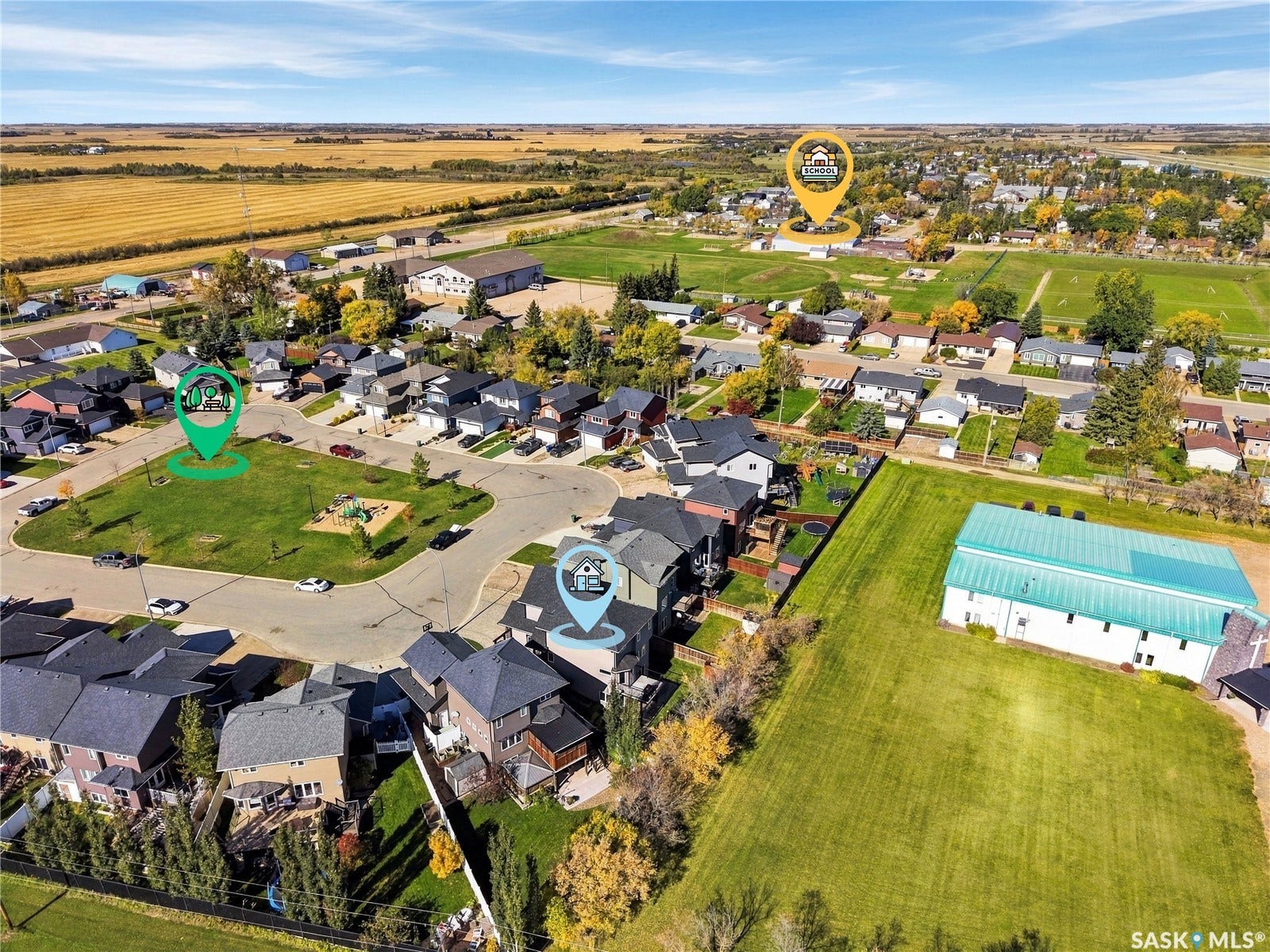 Aerial view of the home, park, school and church