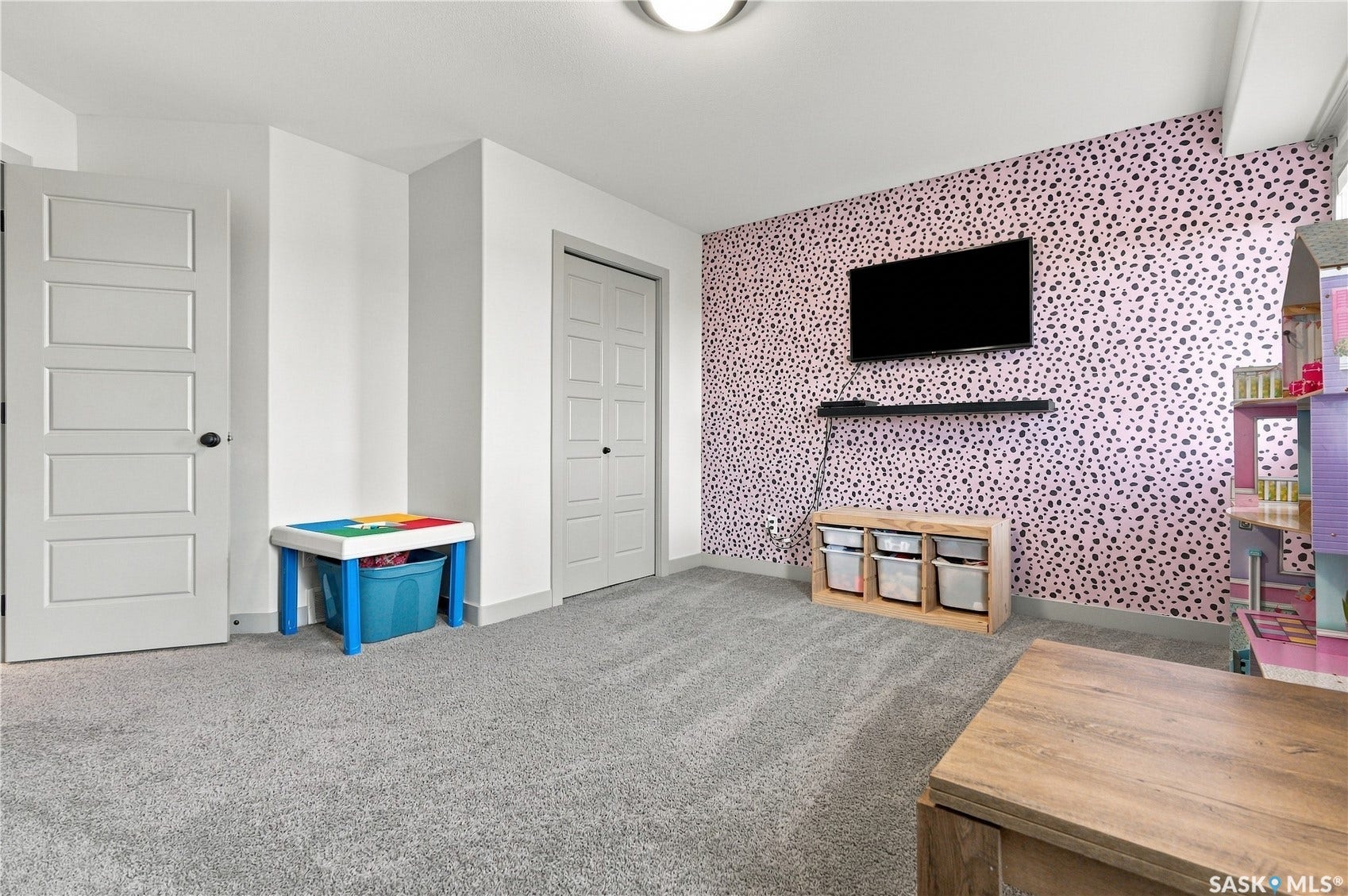 Plush gray carpeting and modern flat-panel interior doors