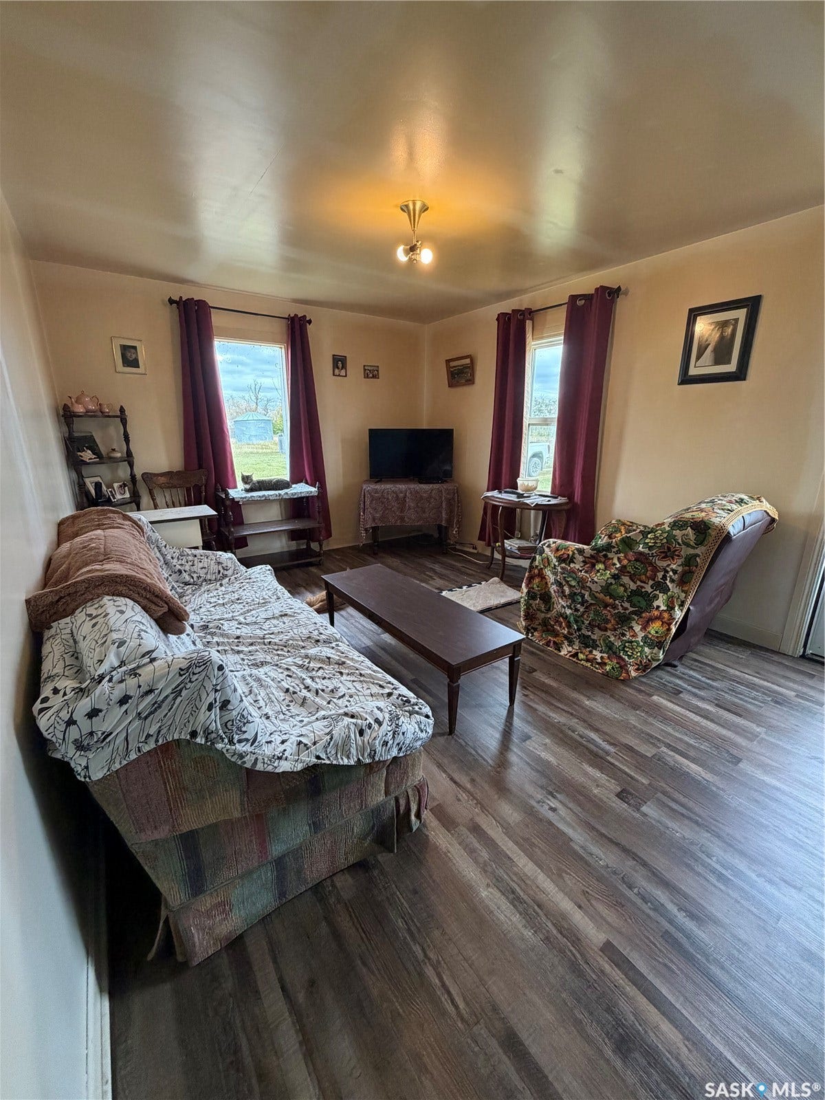 Wood-finish flooring throughout the space