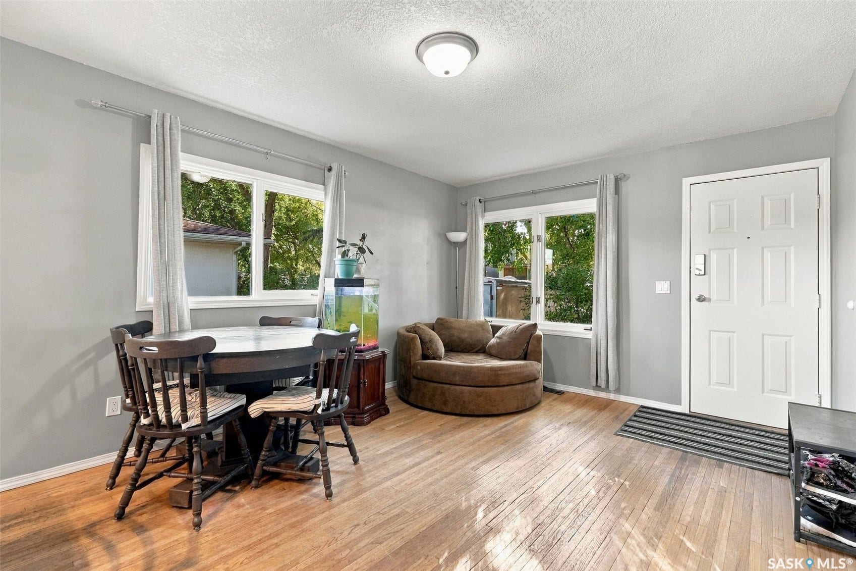 Harwood flooring throughout the room