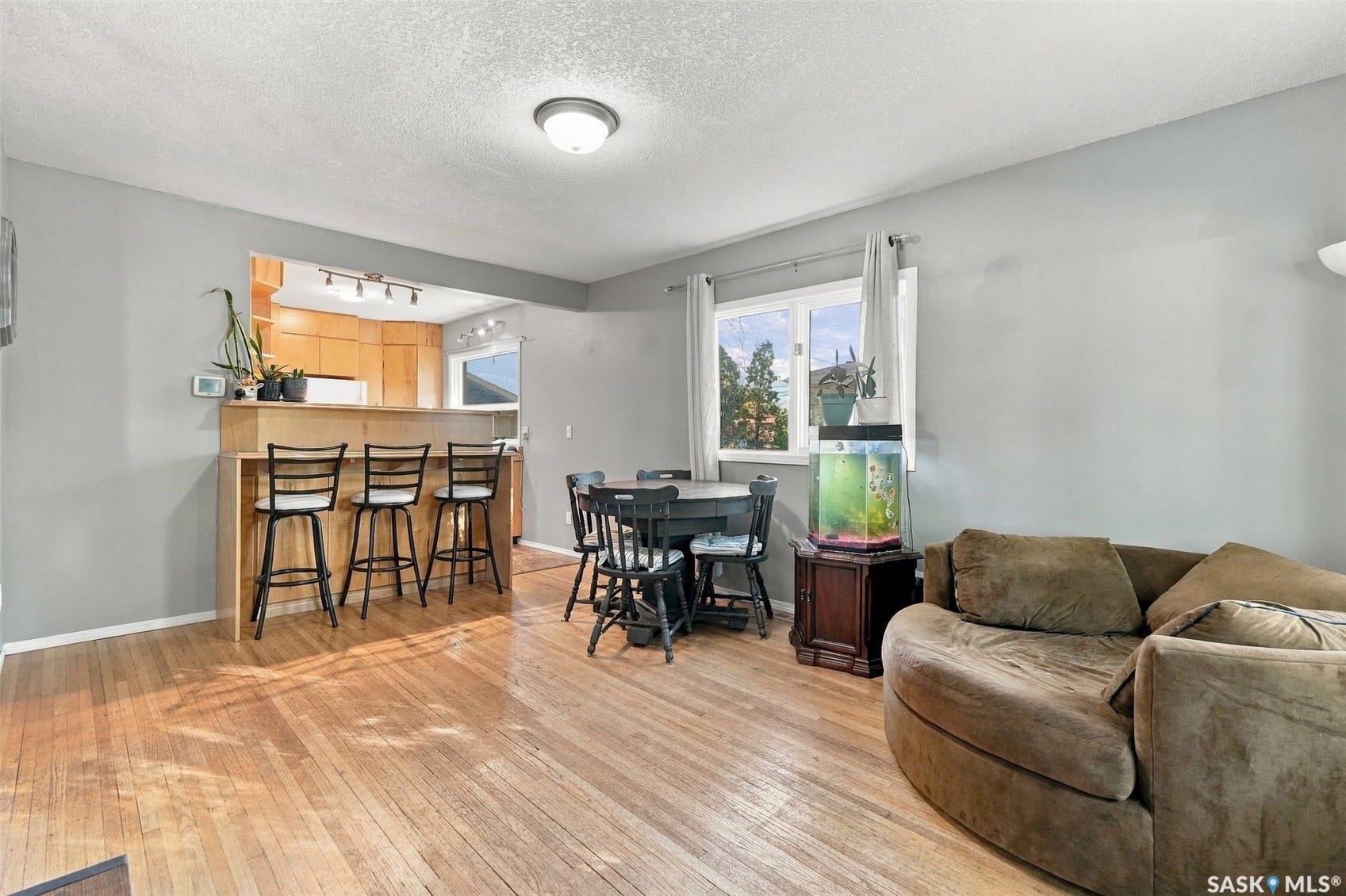 Hardwood flooring throughout the main area
