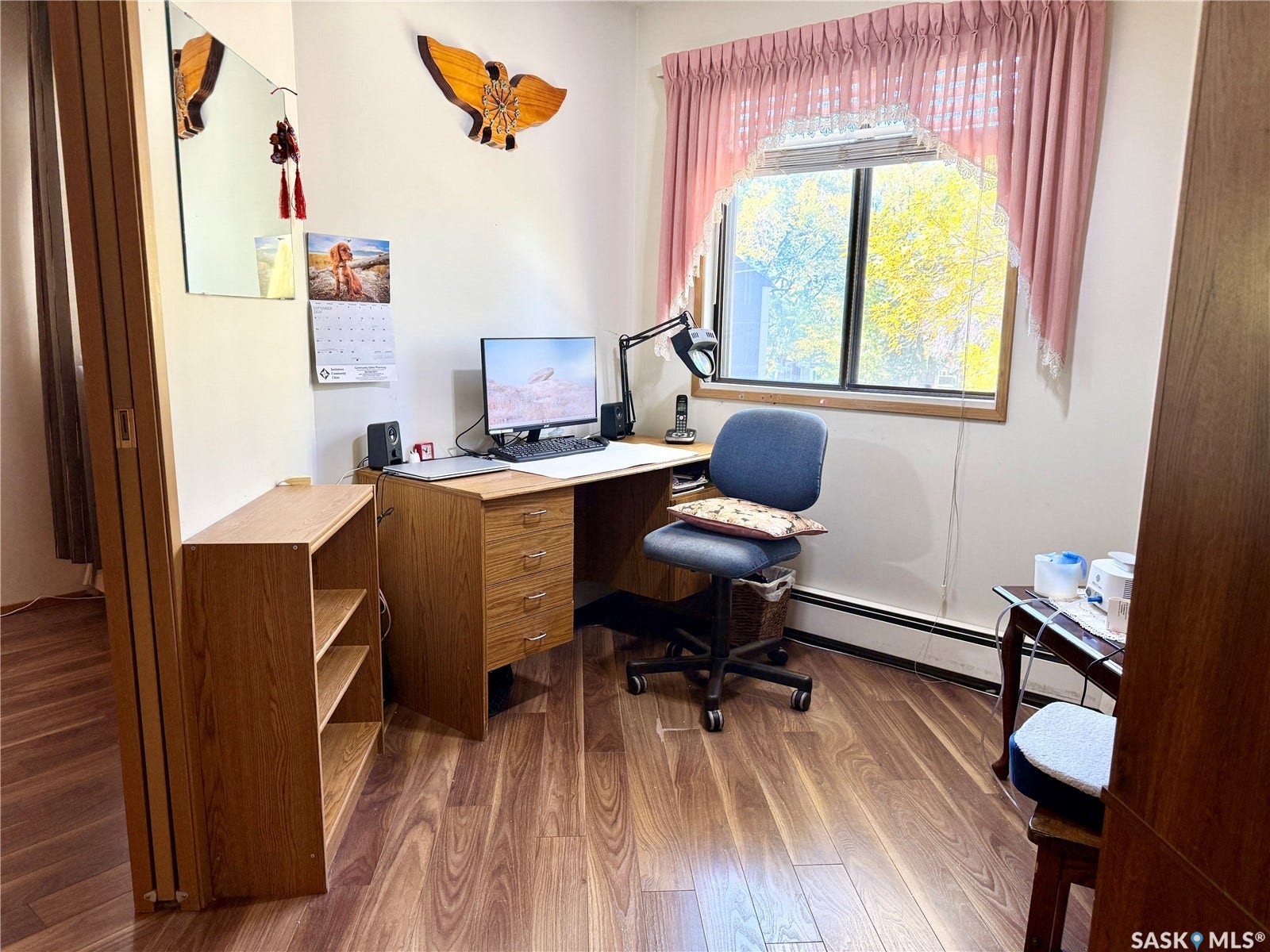 Wood-finish flooring throughout
