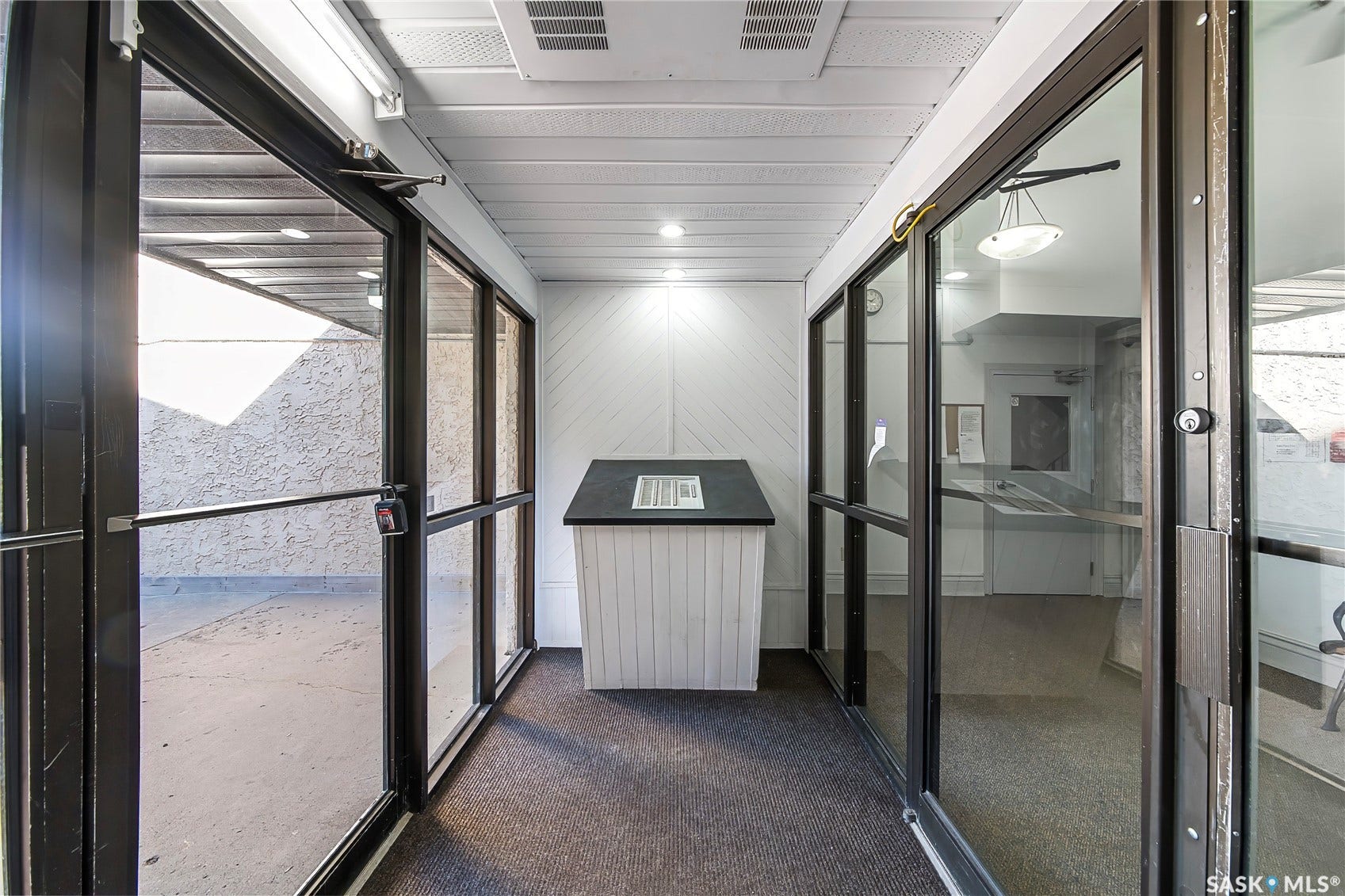 Recessed lighting and a textured ceiling