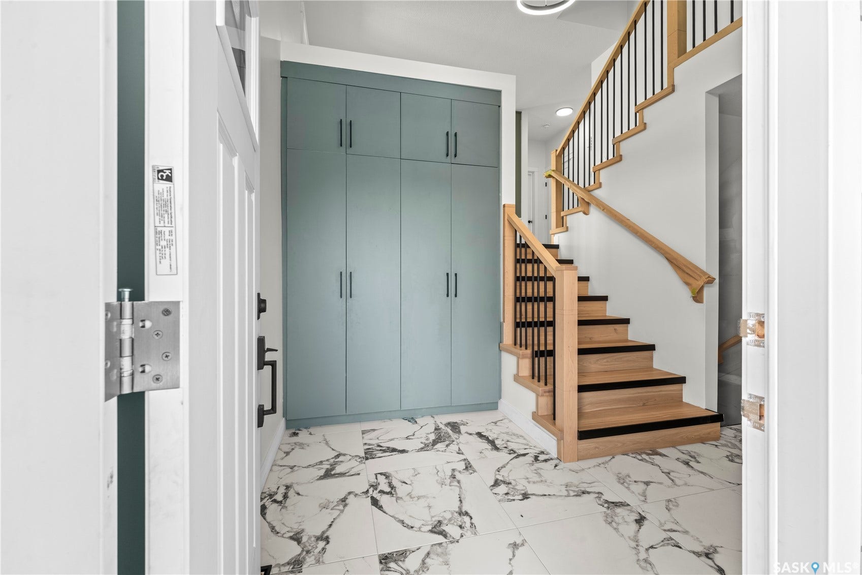 White and black marble-look tile flooring