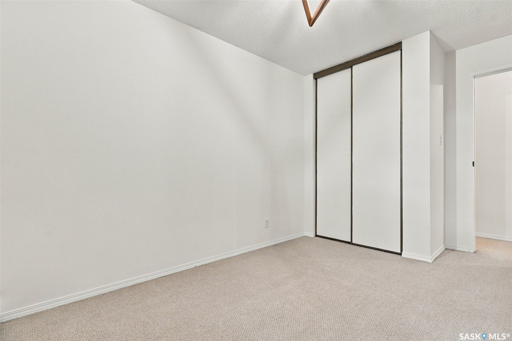 Neutral-toned carpeting throughout