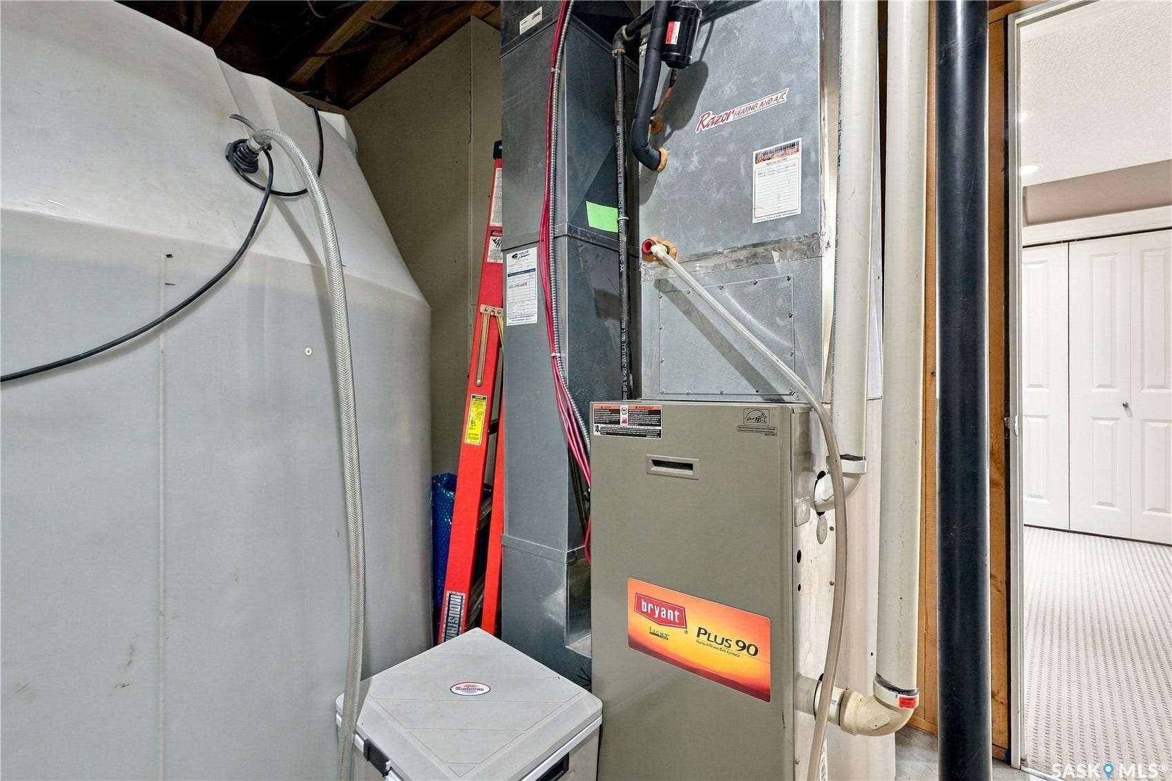 high efficient Bryant plus 90 furnace and holding tank for the slow drip Dundurn rural utility water line