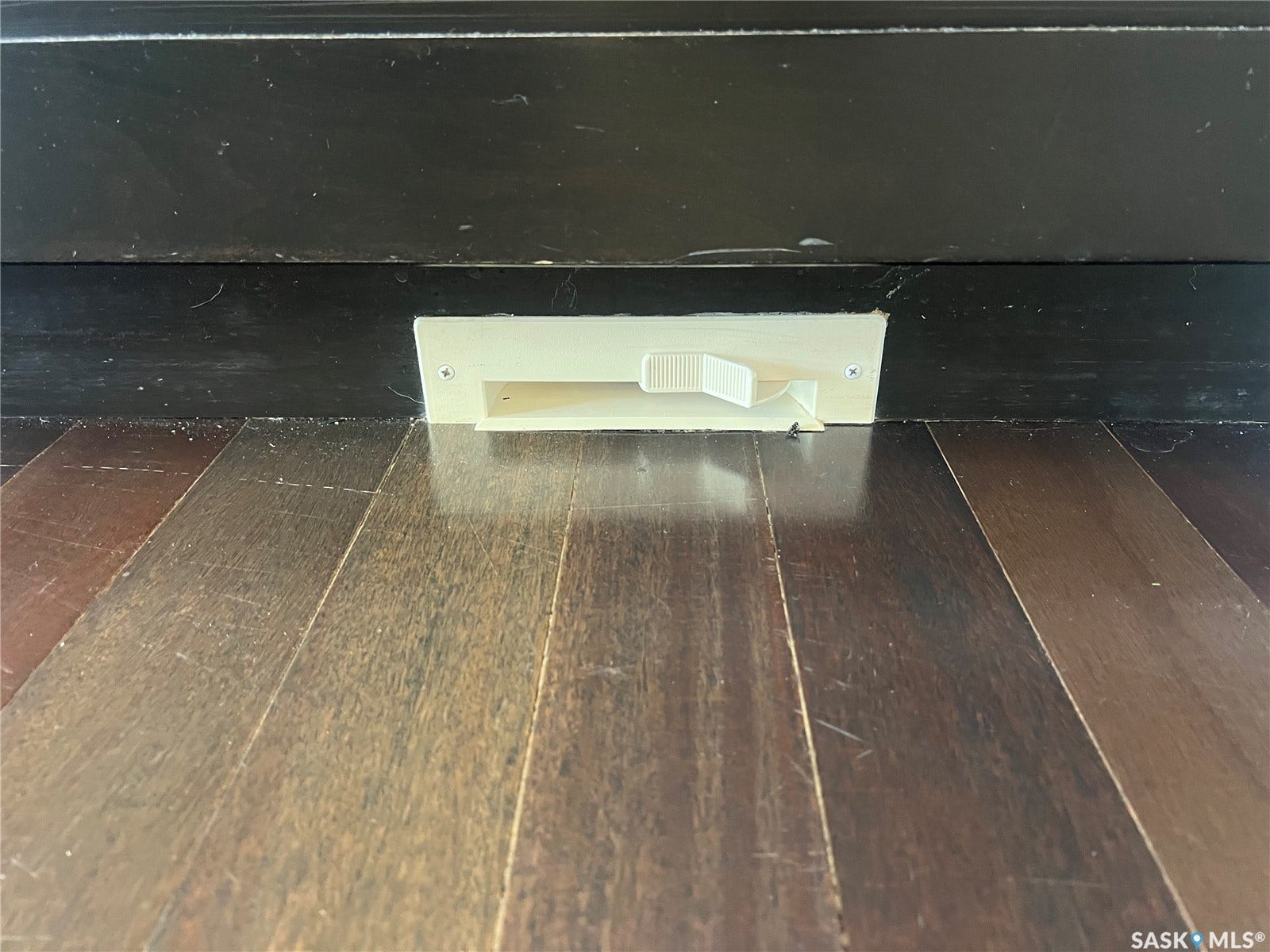 Dust pan to central vac in the kitchen area