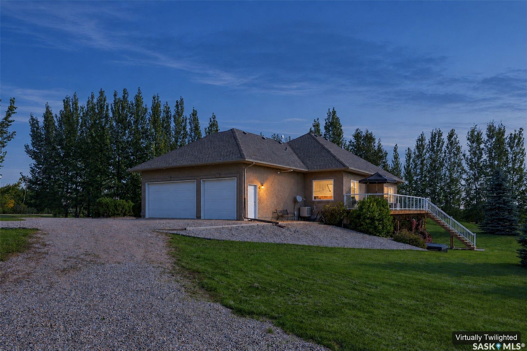 Triple attached and heated garage with direct entry to mudroom and home