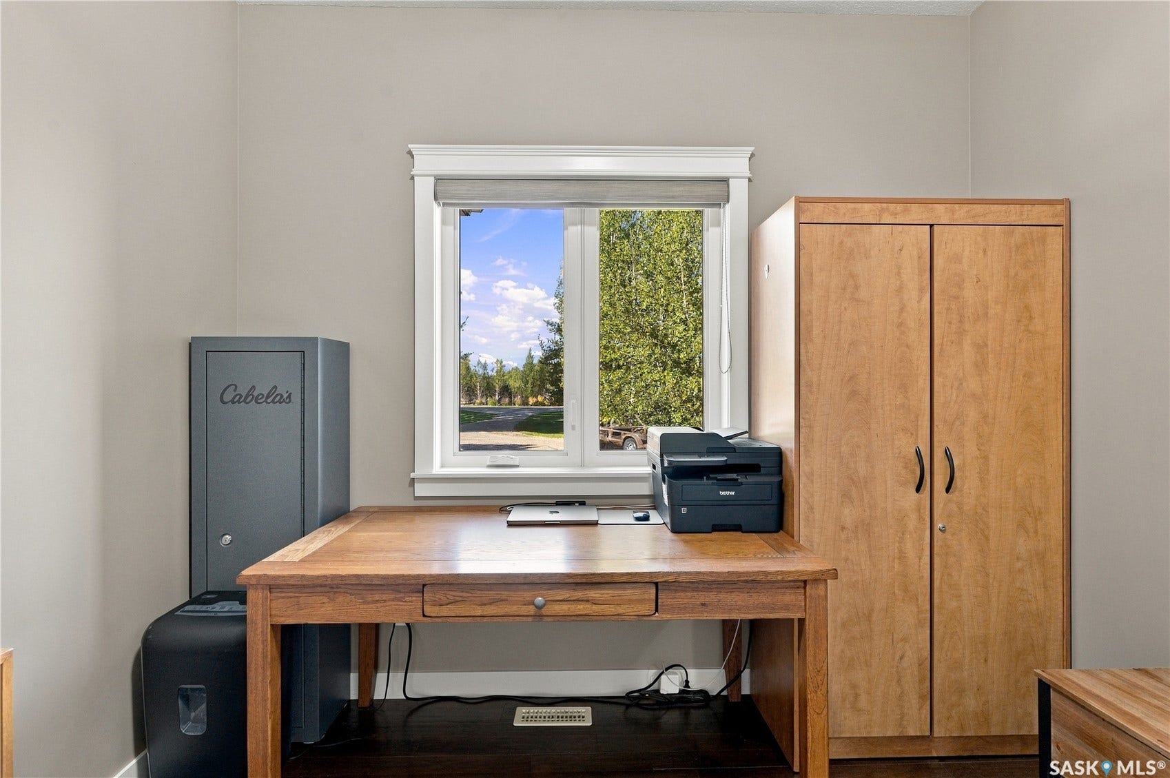 3rd bedroom on main level, presently used as an office with nay=ture views