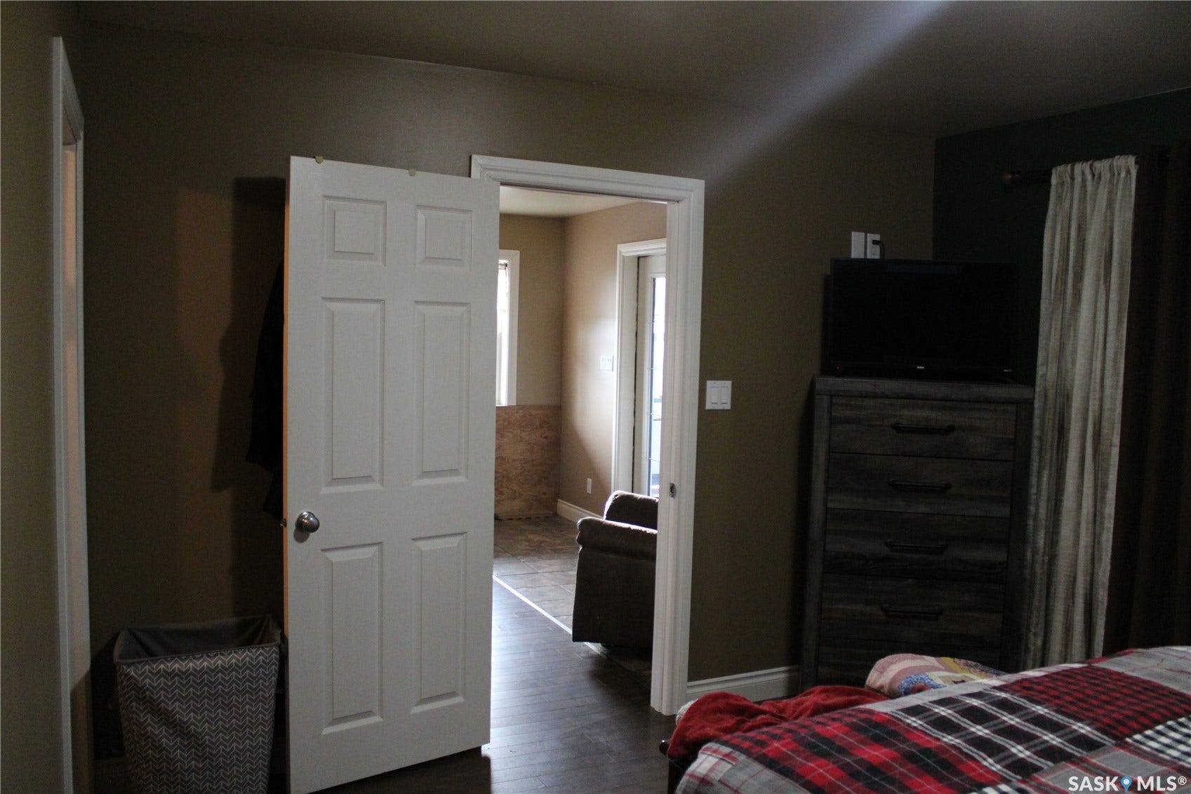 Bedroom featuring dark hardwood / wood-style flooring
