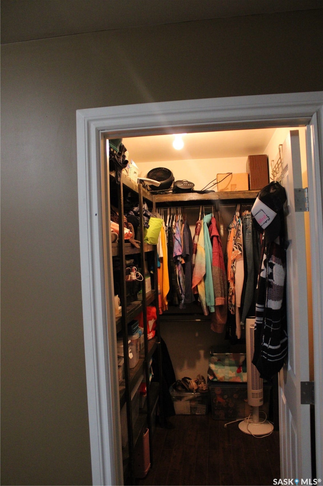Spacious closet featuring hardwood / wood-style floors