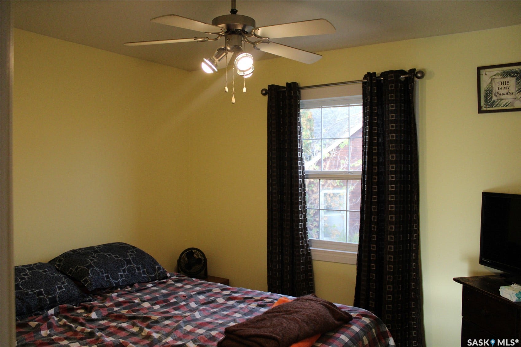 Bedroom featuring ceiling fan