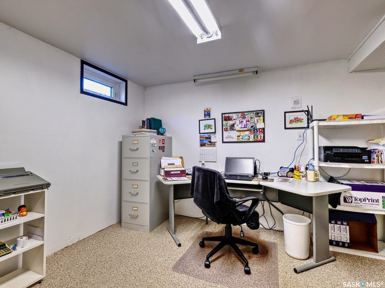 White walls with a single, horizontally oriented window