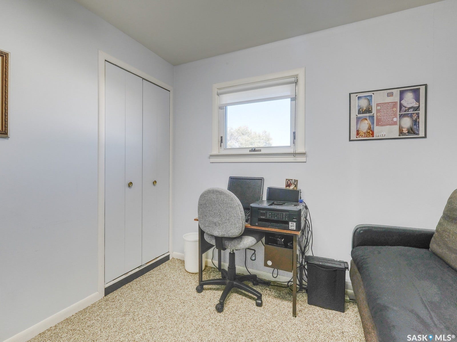 Recessed window with white trim, light-colored walls, and neutral carpet flooring