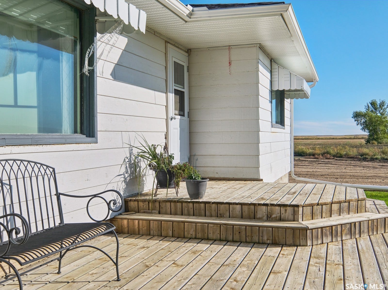 Wood-finish deck with multi-level steps