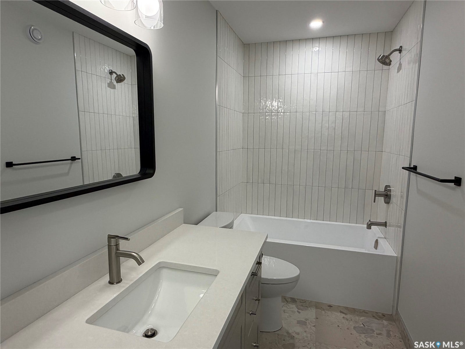 310 Traeger Manor, Saskatoon SK S7V 1Z4 Built-in vanity with an integrated sink and quartz countertop