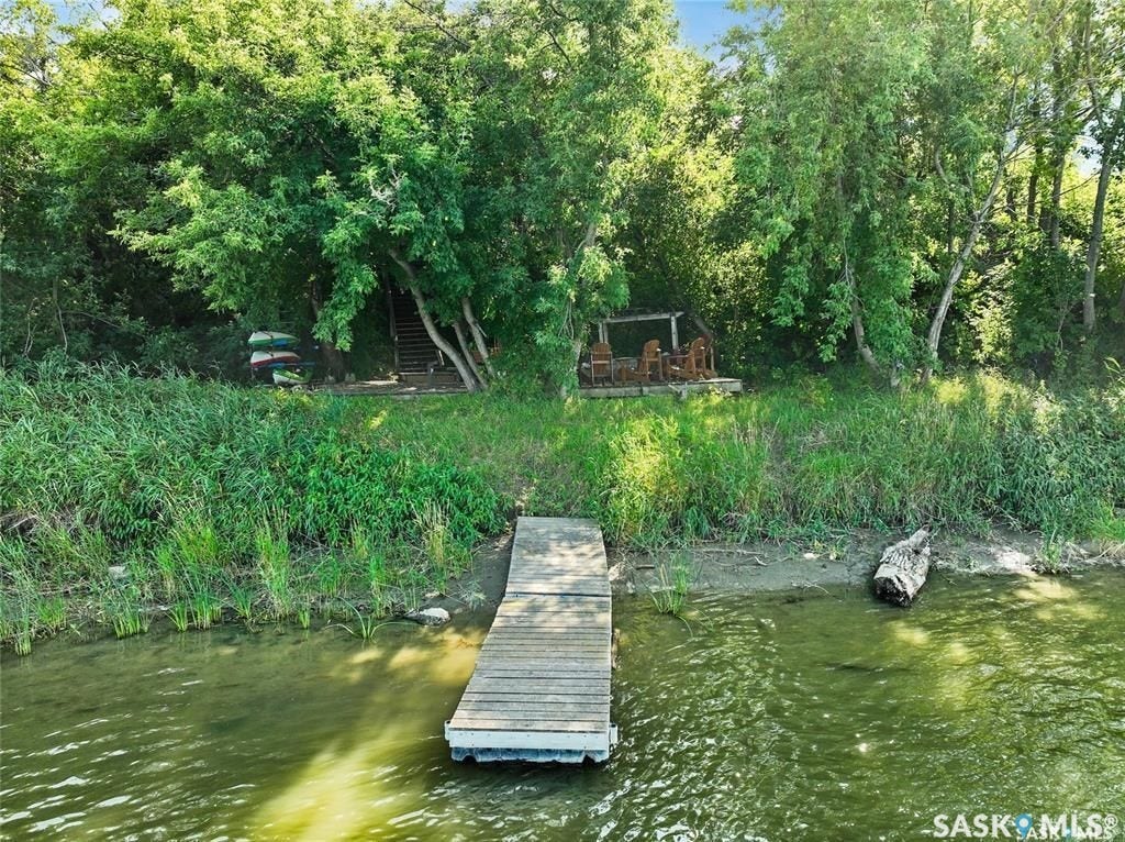 Floating dock extending into the water