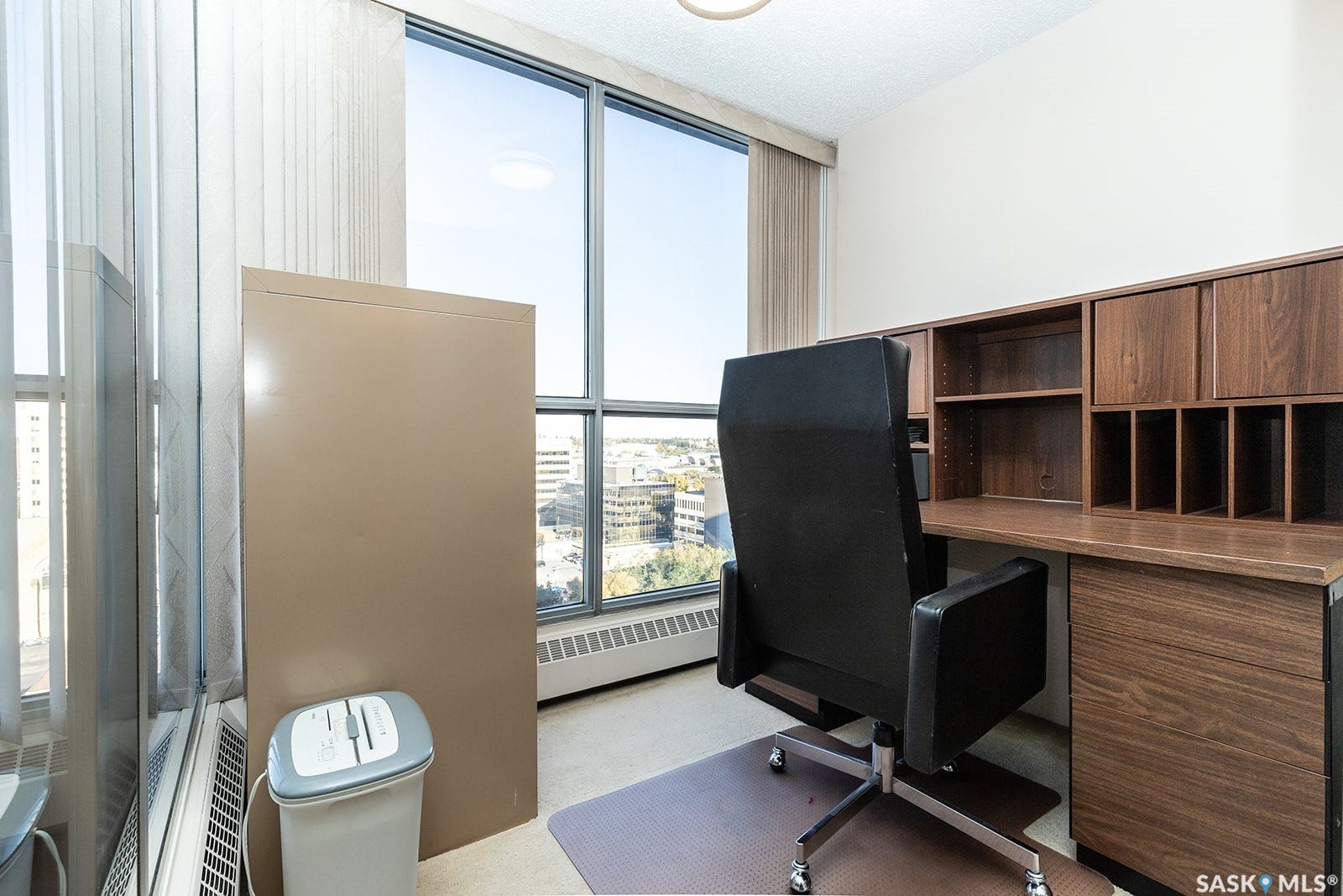 Built-in desk with integrated shelving and cabinetry