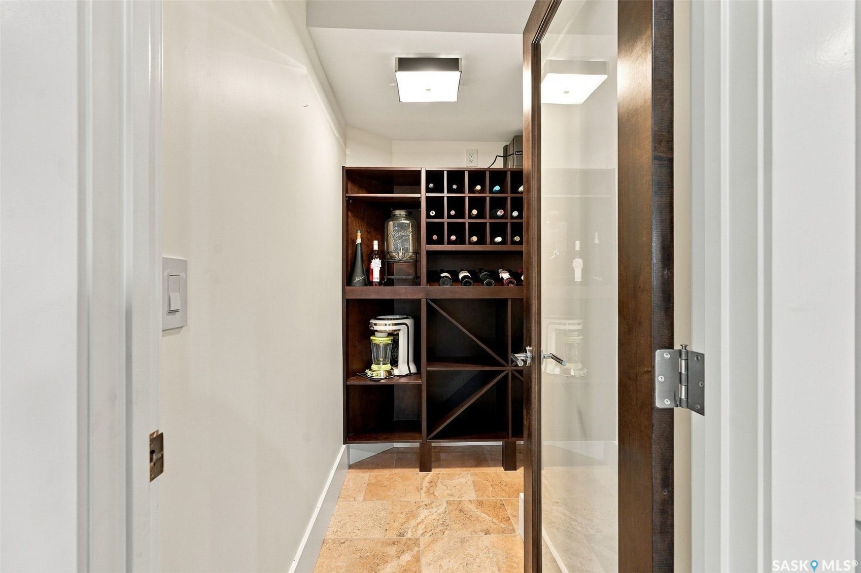 Built-in wine storage cabinetry with X-racks and individual bottle cubbies