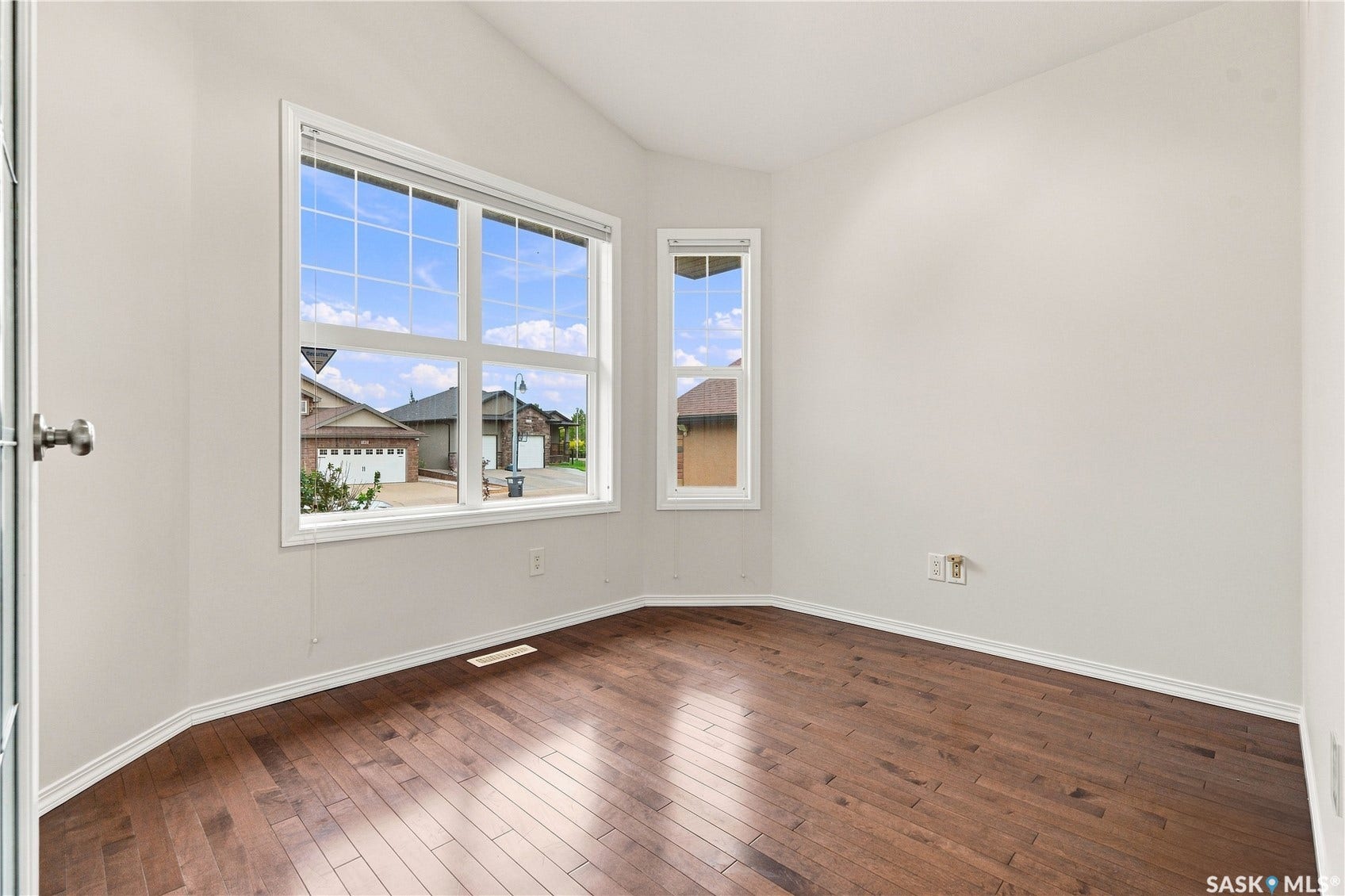 Wood-finish flooring with white trim