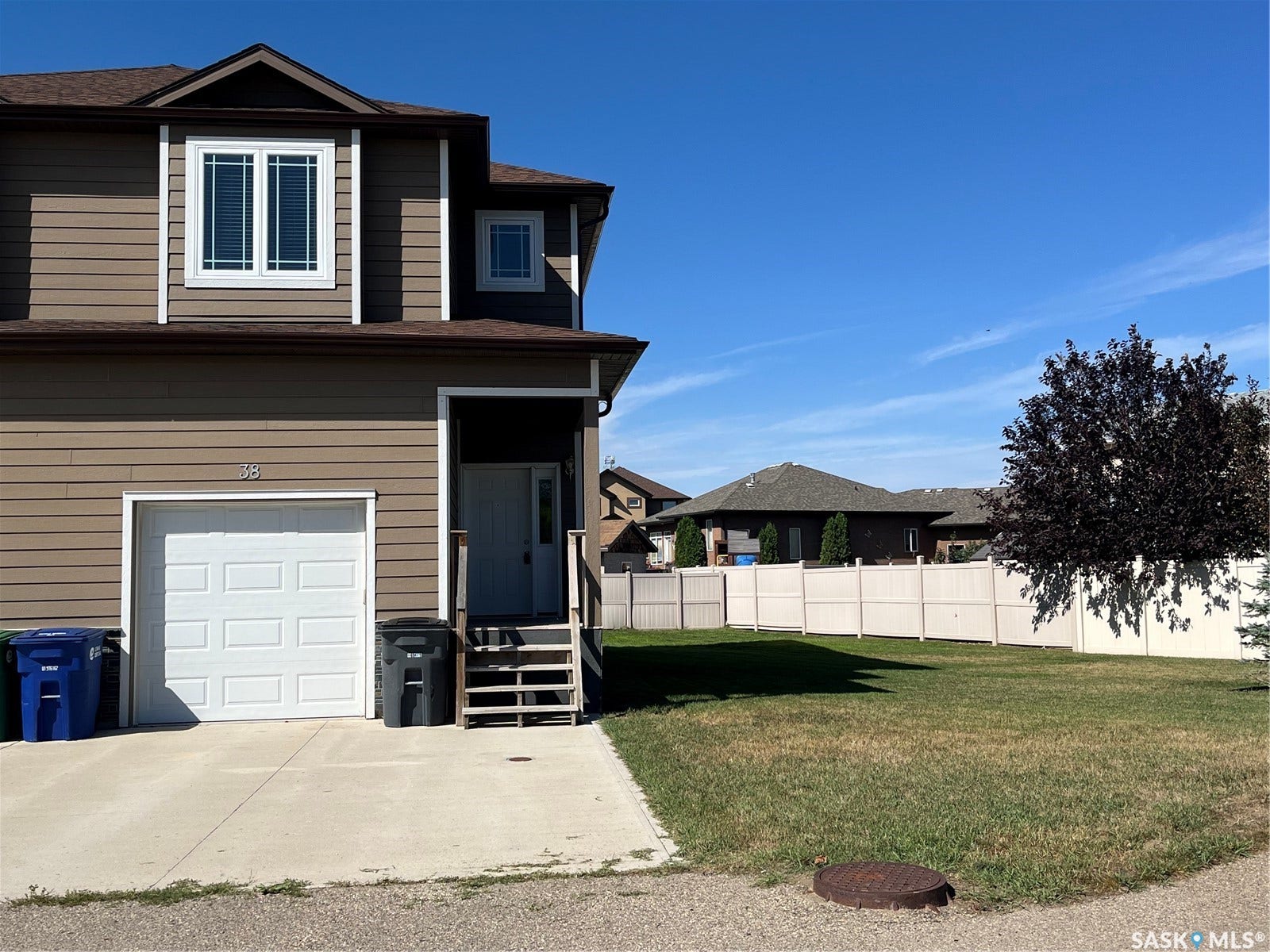 Contemporary exterior siding with white trim accents