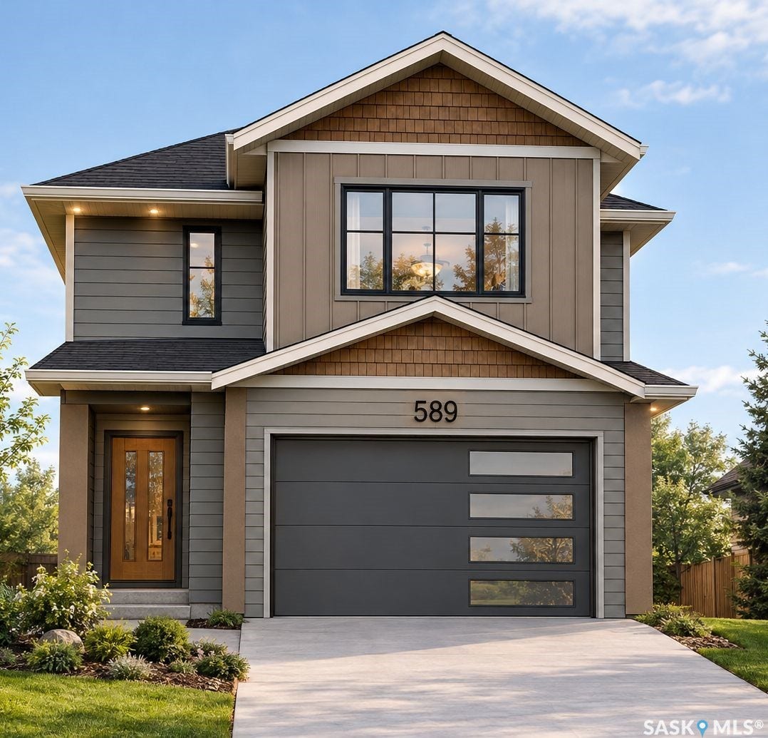 Contemporary exterior featuring a multi-tone facade, prominent gables, and shake accent siding