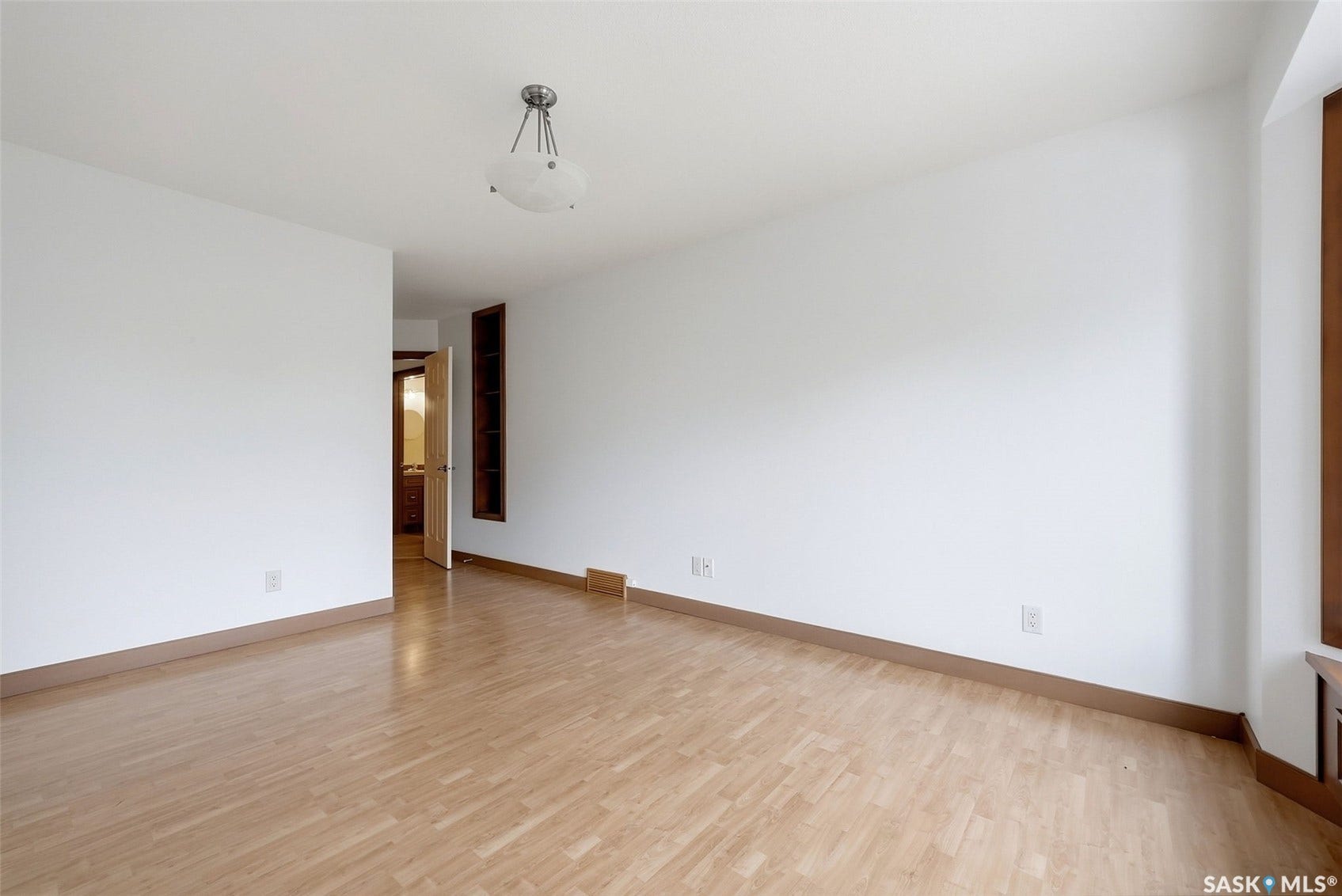 Light wood-finish flooring with coordinating wood trim