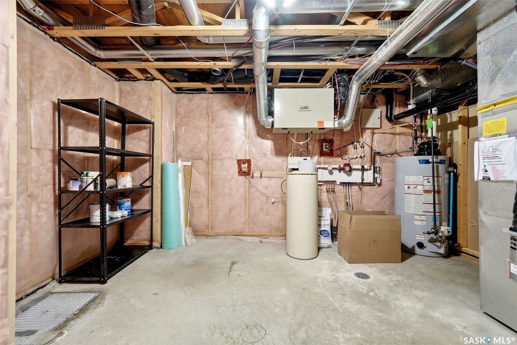 Concrete flooring with exposed ceiling joists