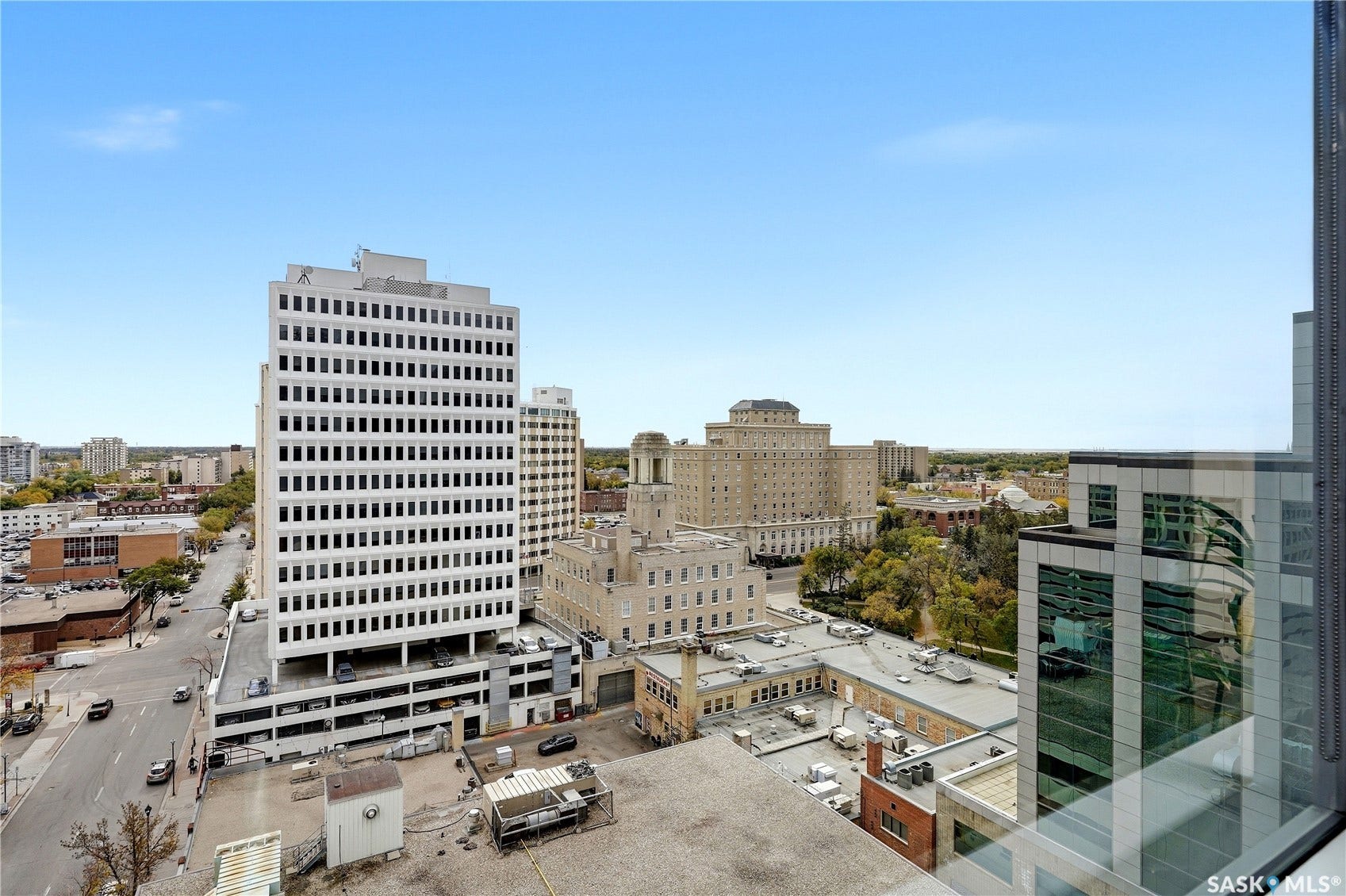 1914 Hamilton Street, #1007, Regina SK S4P 3N6 Cityscape featuring multiple high-rise structures, commercial buildings, and open skies