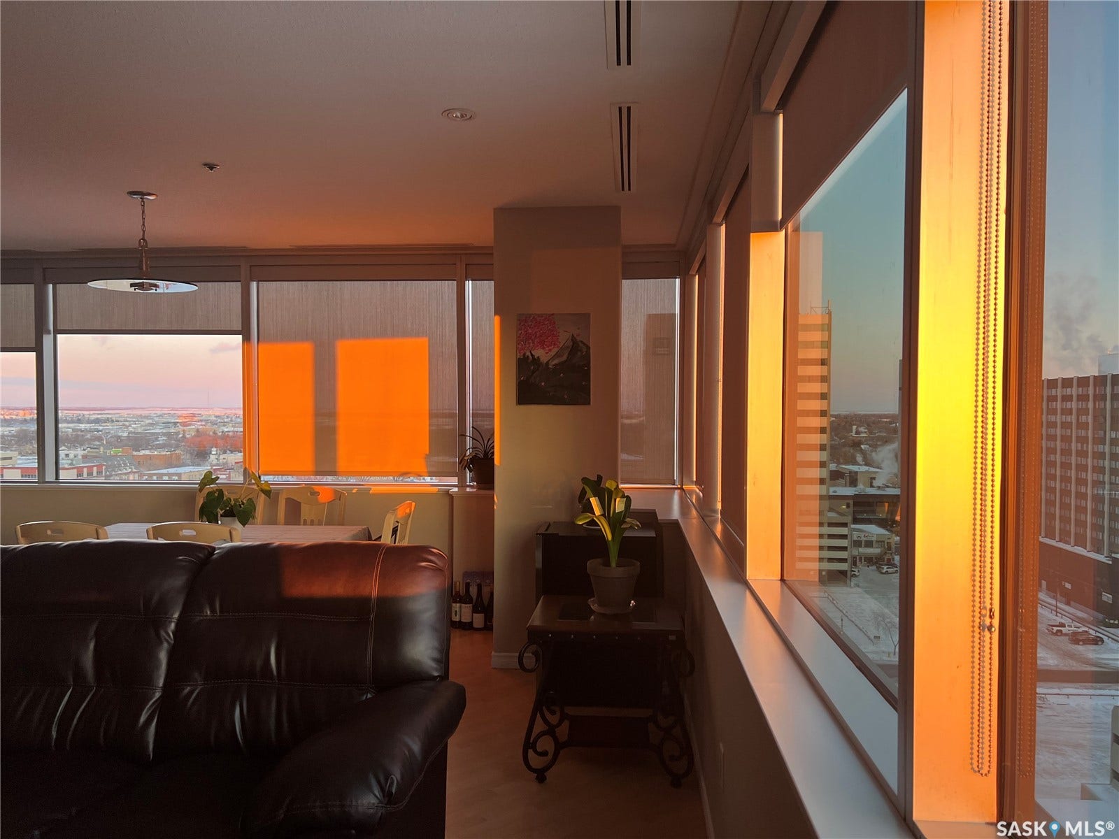 1914 Hamilton Street, #1007, Regina SK S4P 3N6 Expansive wall-to-wall windows, contemporary window treatments, recessed lighting, and a pendant light fixture