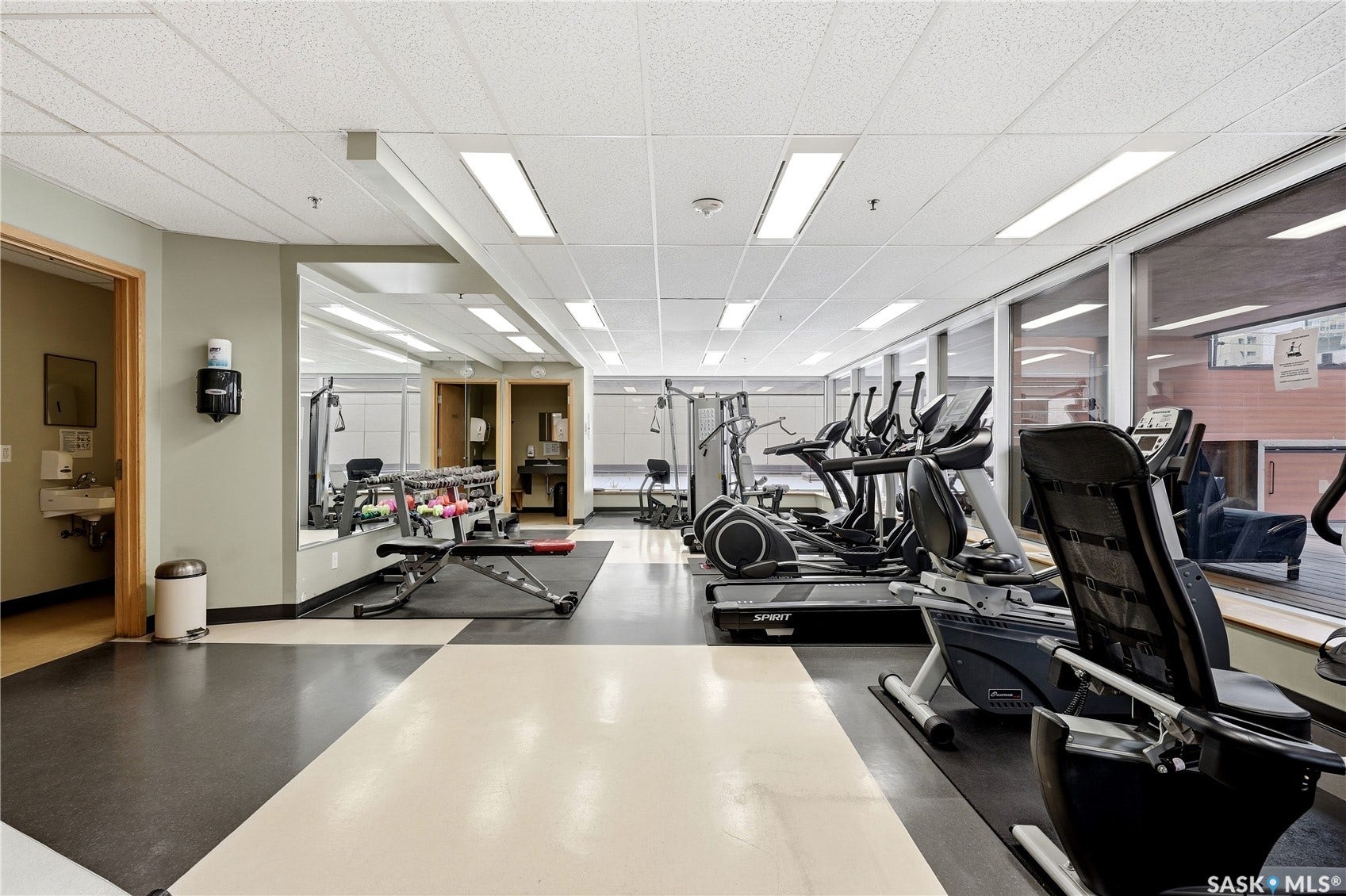 1914 Hamilton Street, #1007, Regina SK S4P 3N6 Fitness center with checkerboard flooring, extensive windows, and recessed lighting