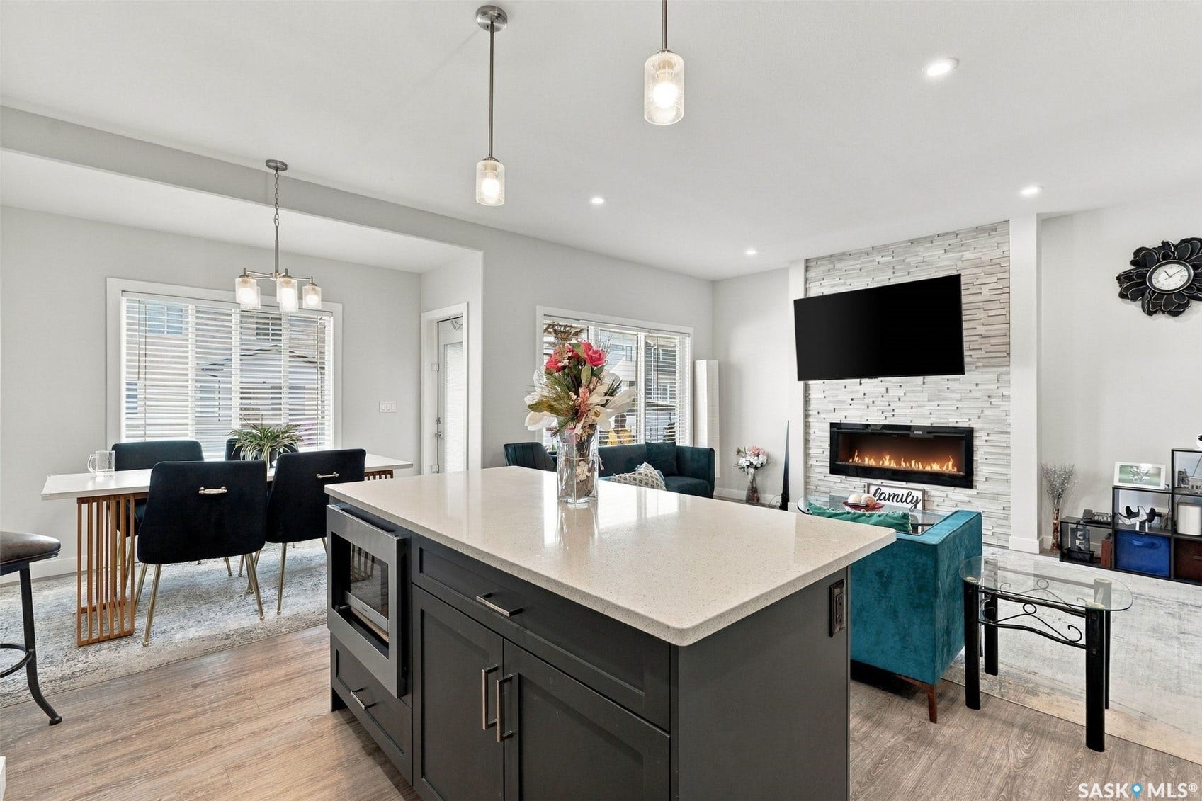 Kitchen island with integrated microwave and light-toned countertop