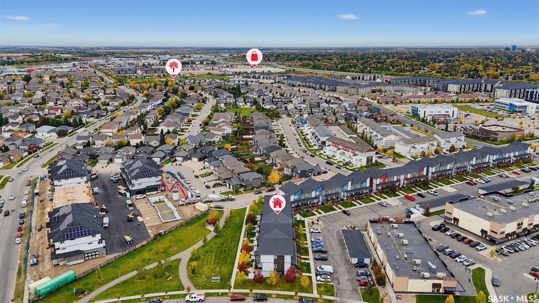 Residential development featuring a mix of housing styles and established tree cover