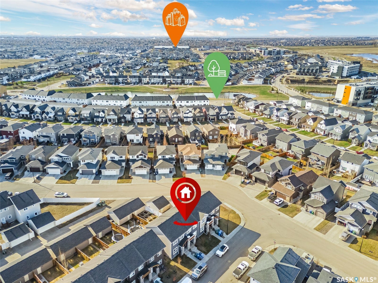 Aerial perspective of a developed residential neighborhood with a variety of housing styles
