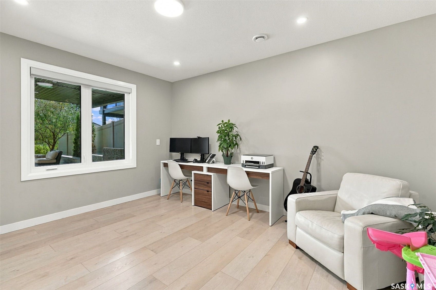 6221 Koep Avenue, Regina SK S4X 0J2 Recessed lighting, light wood-finish flooring, and a large window