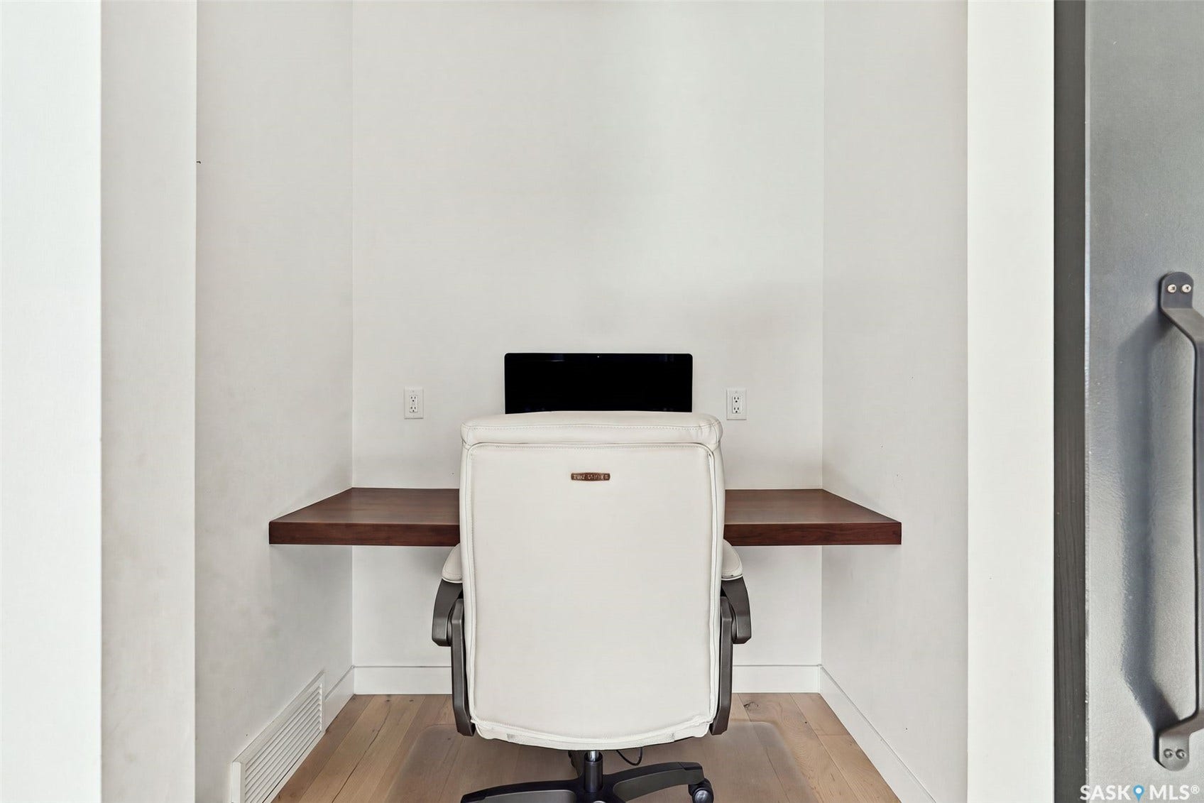 6221 Koep Avenue, Regina SK S4X 0J2 Built-in wood-finish desk with light wood-finish flooring
