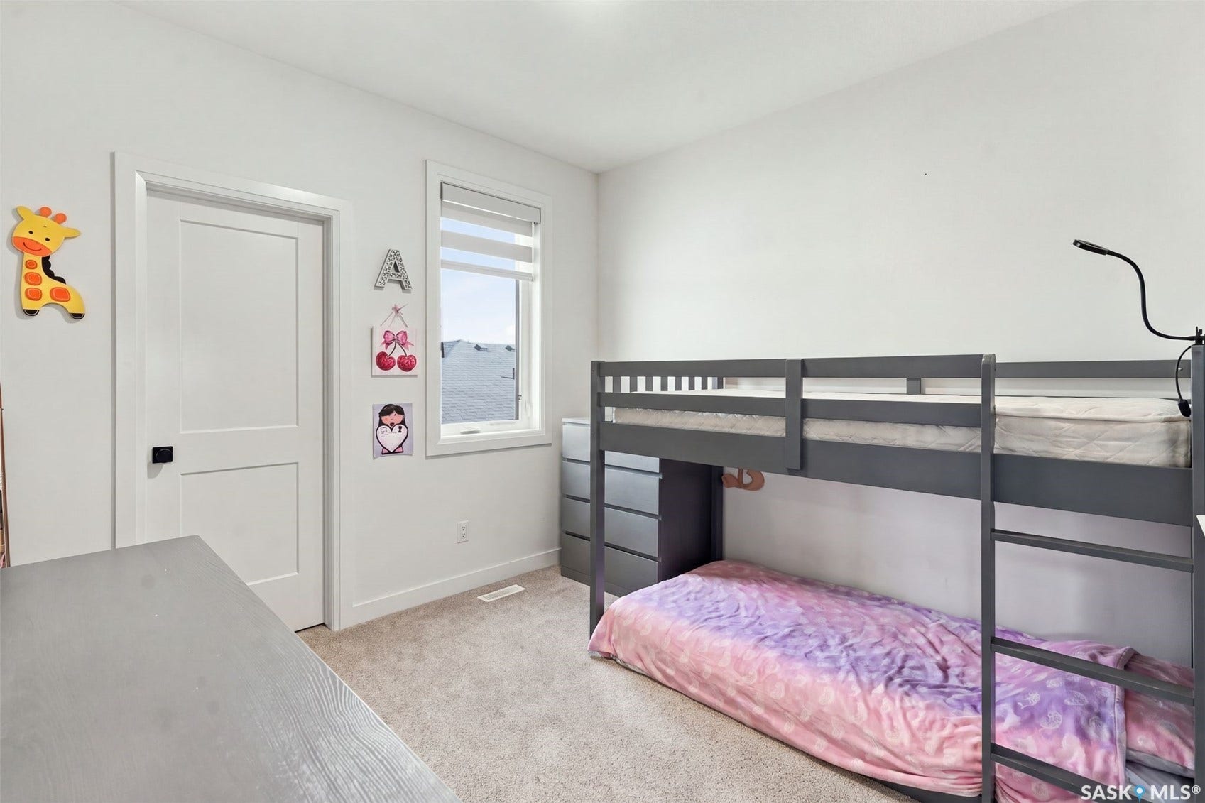 6221 Koep Avenue, Regina SK S4X 0J2 Recessed lighting, light-colored carpeting, white interior doors with black hardware, and a window with blinds