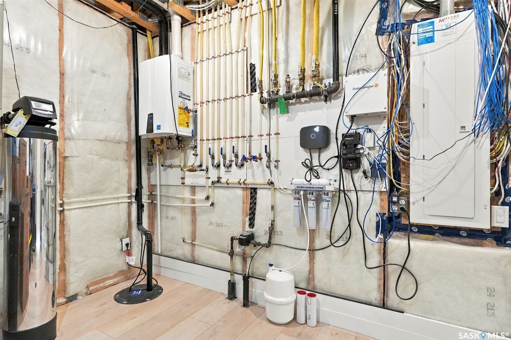 6221 Koep Avenue, Regina SK S4X 0J2 Tankless water heater, water filtration system, water softener, electrical panel, wood-finish flooring