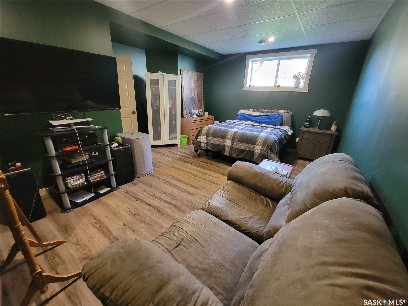 Wood-finish flooring with a low-profile window