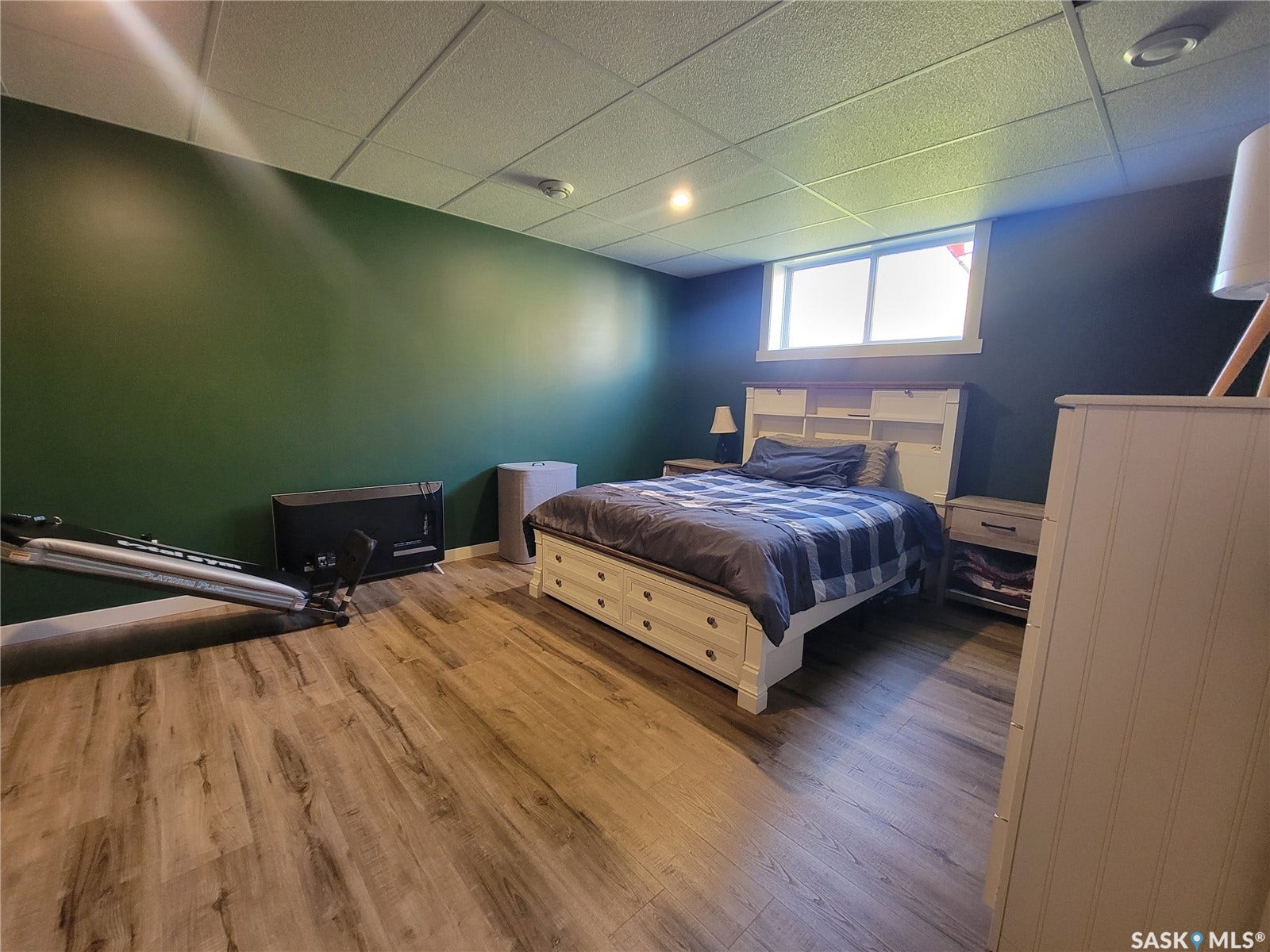 Wood-finish flooring, recessed lighting, and a drop ceiling