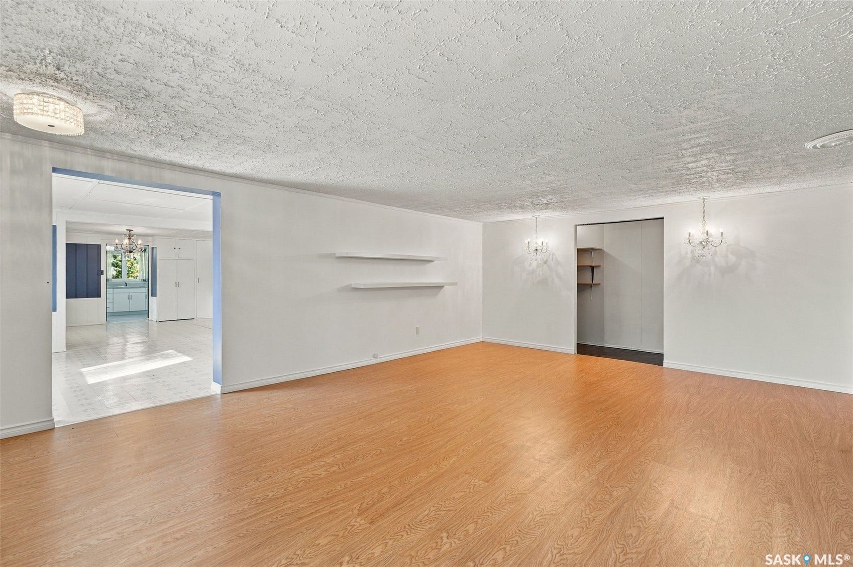 Wood-finish flooring throughout, with flush-mounted ceiling lighting