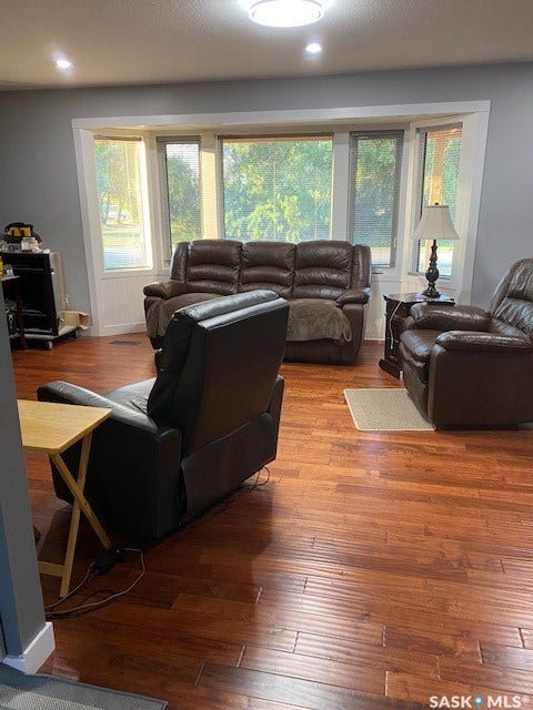 216 2nd Avenue, Wiseton SK S0L 3M0 Bay window with multiple panels, wood-finish flooring, and recessed lighting